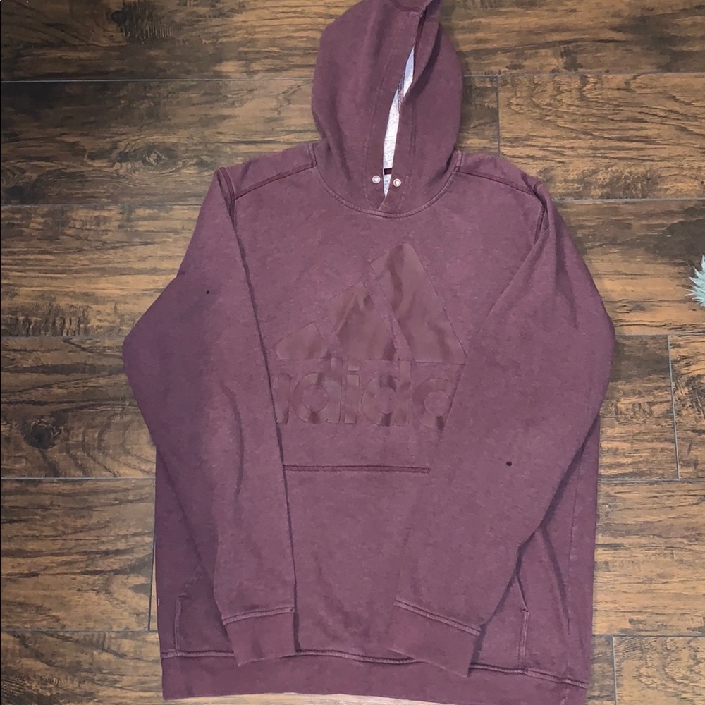 Maroon Adidas hoodie.